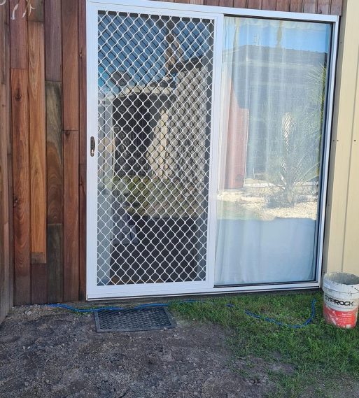 Diamond Grille Barrier Door with White Grille