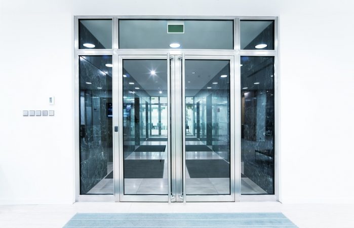 Glass Door In The Office — Security Door Screen in Gatton, QLD