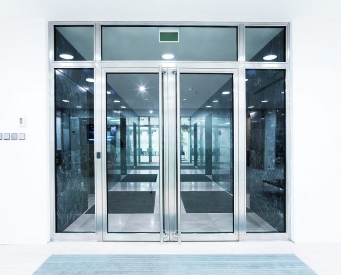 Glass Door In The Office — Security Door Screen in Gatton, QLD